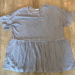 Distressed flowy top